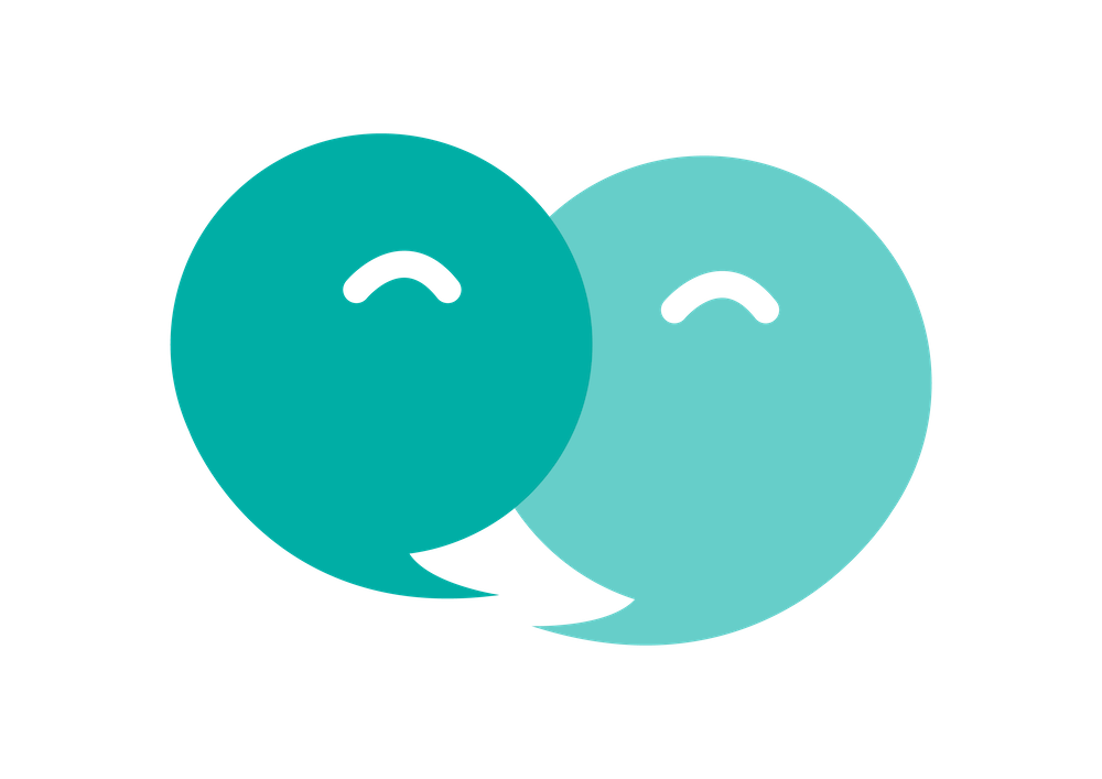 Two overlapping speech bubbles, one teal and one light blue, each with a simple smiley face inside.